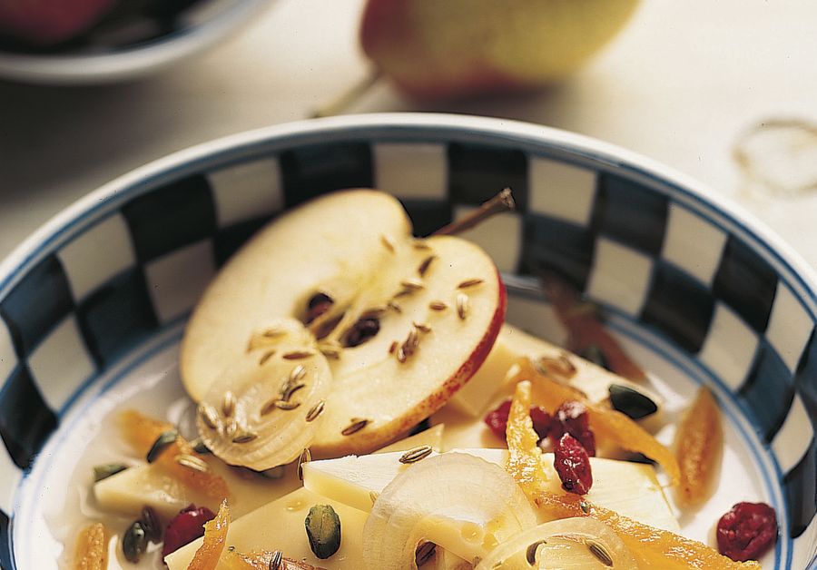 Marinated cheese with fruit and nuts