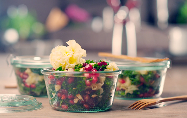 Kale salad with pomegranate and Tête de Moine AOP