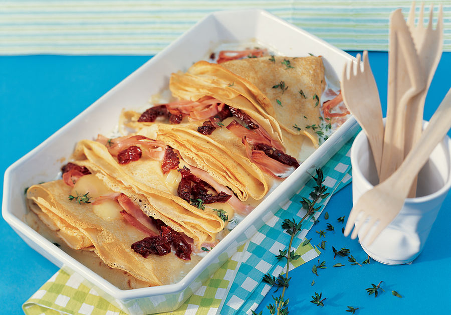 Gratinated ham and raclette pancakes Cheeses from Switzerland