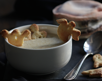 Cheese soup with ghost biscuits