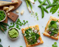 Tartlets with Le Gruyère AOP and Green Pea Spread topped with Spring Vegetables